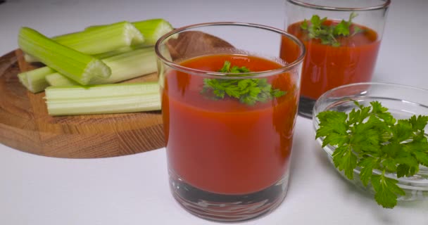 depositphotos 537797356 stock video glasses of tomato juice on